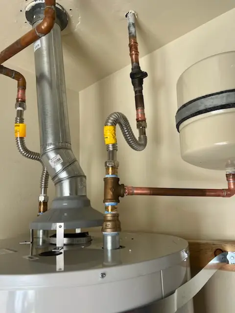 Water heater installation and plumbing repair in Withers